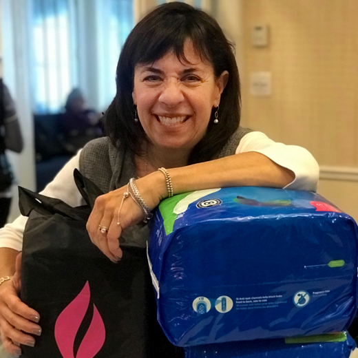 UJA Federation of New York >> Laurie Girsky, chair of UJA Women, recently hosted a packing event for the UJA Dignity Project. Since its launch, the project has given Met Council more than 1,500 bags filled with menstrual hygiene products for distribution to women living in poverty.