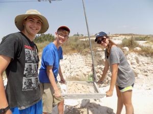UJA Federation of New York >> Robert (at left) and other teens sorting through archeological dig finds.