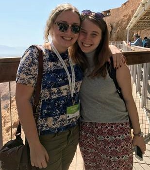 UJA Federation of New York >> Angela, left, with a fellow student at Masada during the ASB Israel trip.